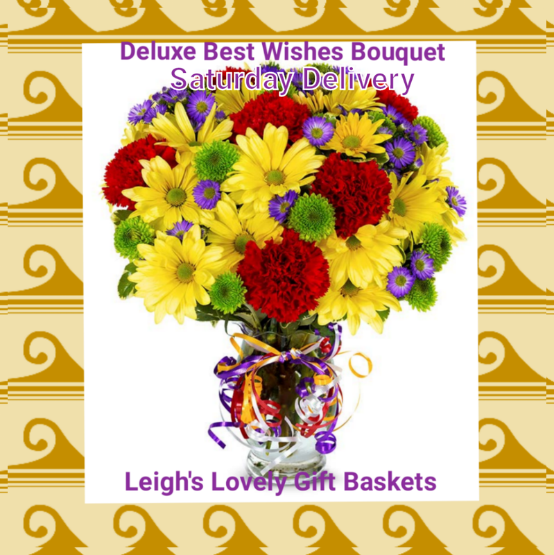 Deluxe Best Wishes Bouquet with Saturday Delivery. Colorful bouquet is   overflowing with vibrant colors and seasonal flowers, Arrangement measures 14"H by 11"L.  Bouquet features Red Carnations, Yellow Daisies, Purple Monte Casino and
Green Button Poms
Includes a clear glass vase trimmed with Rainbow Ribbons. Personalized Card Message is included. Freshness Guaranteed. Special Saturday Delivery $22.95 Ships by UPS in a box straight from our Flower Farms. Sorry No Saturday shipping to hospitals and funeral homes
VASE MAY VARY