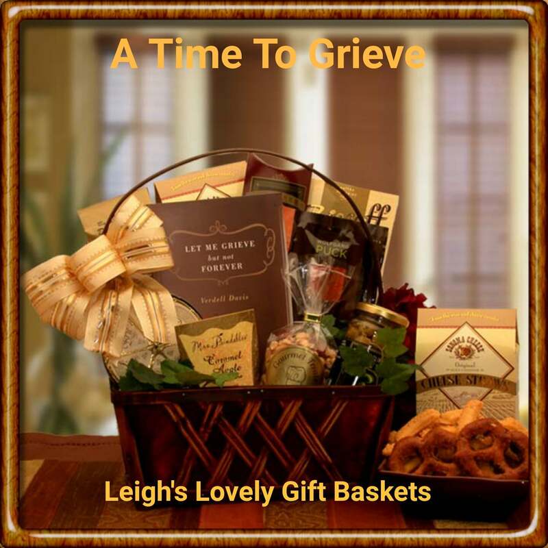 A Time To Grieve Sympathy Gift Basket offers an inspirational " Time To Grieve" gift book and delicious gourmet treats to the bereaved. Dark-stained wood basket with handle and homemade bow overflows with cheese wedges and sausage,coffee,Mrs. Prindables caramel apple stickies, Pimento-stuffed olives, Cheddar cheese straws, Wolfgang coffee, Biscoff European cookies, Honey mustard pretzel nuggets, Deluxe mixed nuts, Foil-wrapped brie cheese wedges, Sliced summer sausage and " Let Me Grieve" gift book. 