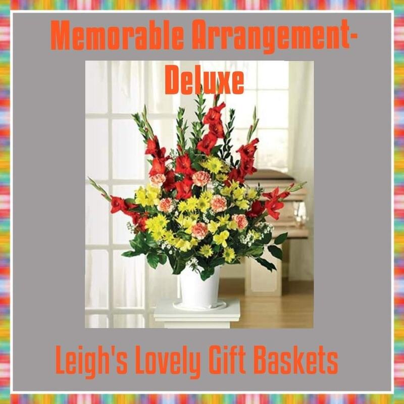 Memorable Arrangement Deluxe is a truly vibrant arrangement bursting with bright hues of red, orange and yellow!  Includes Red Gladiolas, Orange Carnations ( bi-color) and Yellow Alstroemeria arranged in a white floral container. This arrangement is designed to be displayed on a stand. Same Day Delivery Service available. 
