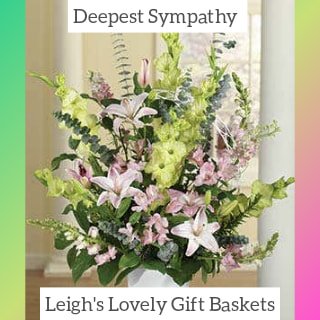 Deepest Sympathy is a lovely testimony in flowers! Pink Snapdragons,Pink Lilies, Alstroemeria
and  Green Gladiolus arranged in a  White Floral Container. Same Day Delivery Service available. 