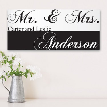 Our Personalized Mr. and Mrs. Gallery Wrapped Canvas Print is a perfect addition to the New Couple's home!

Canvas Size: 8" x 18"

Personalization: Bride and Grooms First Names and Couple's Last Name
