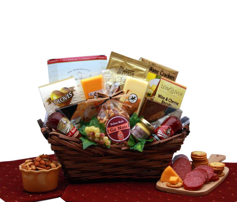 Wood tray with wooden ear handles is adorned with faux grapes and leaves. Includes  Salami with Garlic, Usinger’s Beef Summer Sausage, Wisconsin Cheddar Bar, Swiss Cheese bar, Parmesan Flatbread crisps, Three Pepper Water Crackers, Dill Seasoned Pretzel Nuggets, Los Olivos Wine Biscuits,Go Nuts Deluxe Mixed Nuts, Champagne Mustard, Smoked Gouda Cheese Spread, Asiago Cheese Spread,  Usinger’s Beef Salami with Garlic,  Usinger’s Beef Summer Sausage,  Wisconsin Cheddar Bar, and Swiss Cheese 