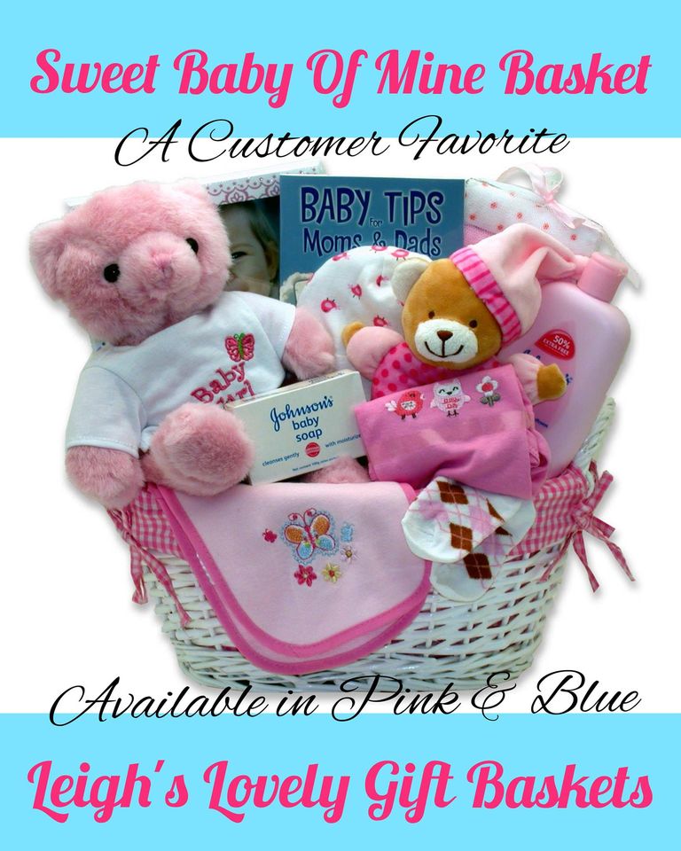 Welcome that sweet baby with this fabric lined hamper filled with essentials!  Includes 
It's a Boy/It's a Girl Baby Teddy Bear w/Tee Shirt, Baby Bear Rattle, 3 pc Terry Cloth Baby Wash Cloth, Baby Booties, Beanie,
Baby Tips for Moms and Dads Book,
5x7 Baby Picture, Frame, 100% Cotton Baby Tee Shirt, Johnson and Johnson Baby Soap, and a
Baby Burp Cloth