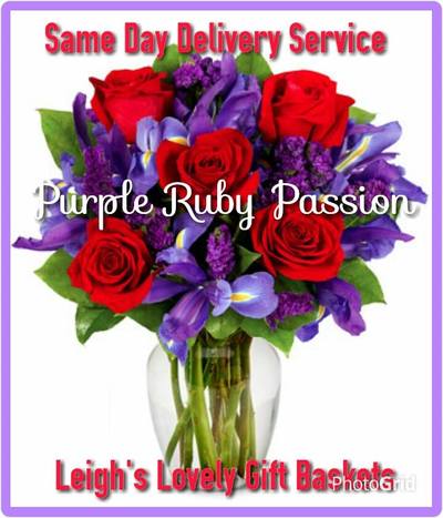 Purple Ruby Passion  Bouquet is truly romantic with Red Roses,Purple Statice and Blue Iris arranged in a clear glass vase. Same Day Delivery Service available.