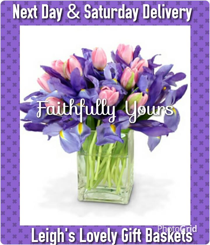 Faithfully Yours Bouquet with pink and blue flowers in a clear rectangular glass vase