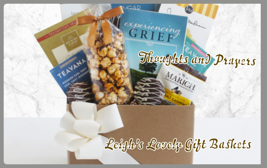 Kraft gift box is topped with a printed sympathy ribbon bow. An angel figurine and inspirational book accompany an array of gourmet snacks including Chocolate Dipped Oreo,  Biscotti, Wafer Cookie, Caramel Popcorn, Snack Mix, Cookies, Cheese Straws, Chocolate Dipped Nuts and a tea bags. 
