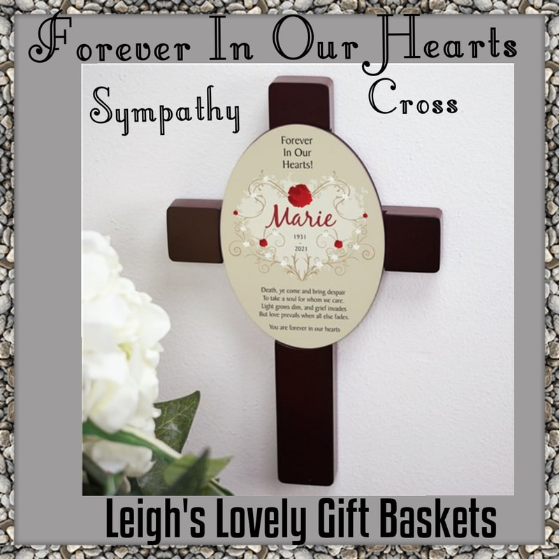 Forever In Our Hearts Keepsake Wall Cross with free personalization. Simulated woodtone 
Keepsake cross measures 11" L x 7" W. Personalized cross .Personalize with name, birthdate and year of death. 