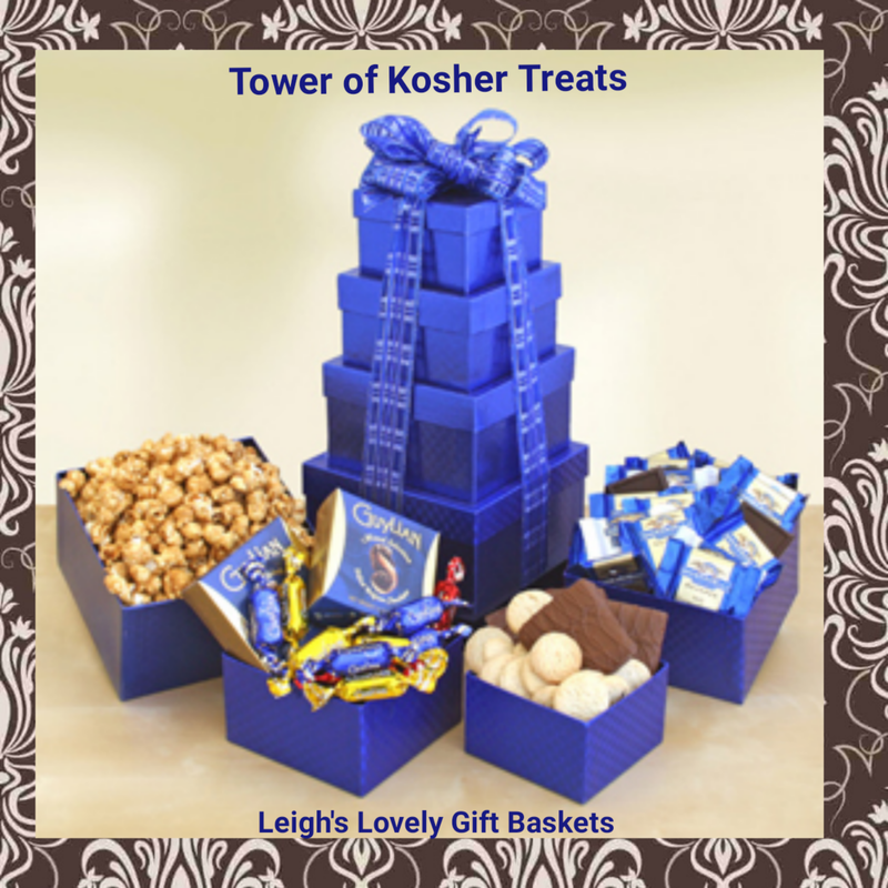 Bright blue boxes tied with a matching blue ribbon bow hold a trove of chocolate treats 
 including caramel popcorn, Guylian chocolates, chocolate covered graham crackers, Snickerdoodle cookies and Ghirardelli chocolate squares.