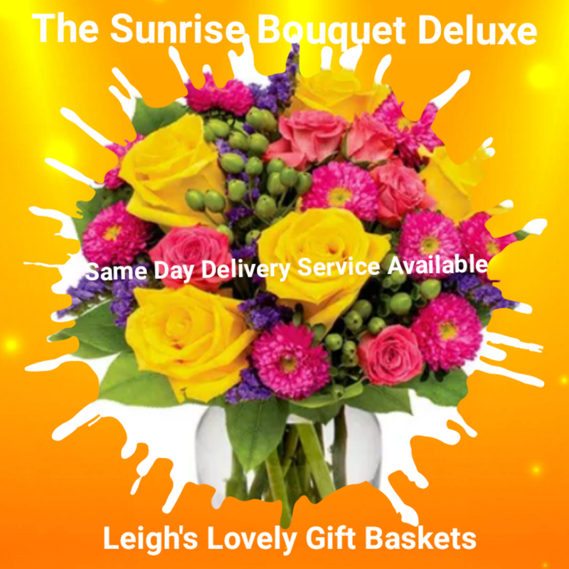 The Sunrise Bouquet Deluxe bursts forth with vibrant colors resembling the morning sky. Featuring  Hot Pink Roses, Yellow Roses, Pink Aster and Purple Statice arranged in a clear 
classic glass vase. Delivered by a local network florist with Same Day Delivery Service for Same Day Delivery Service Monday through Friday. 