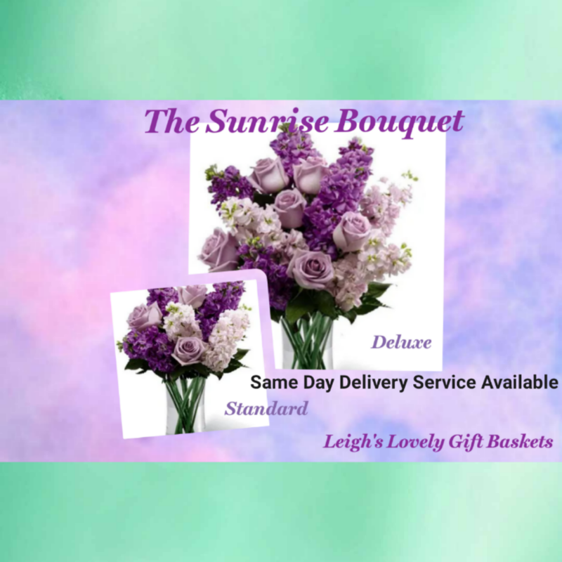 The Sunrise Bouquet features a medley of Lavender Roses, Pink and Lavender stock and lush greens artfully arranged in a clear, cylindrical glass vase. This beautiful arrangement is available in Standard  and Deluxe, all arranged and delivered by a local network florist with  Same Day Delivery Service. Order  Monday- Friday. Order before 10 am EST for Same Day Delivery Service or order ahead. 
 