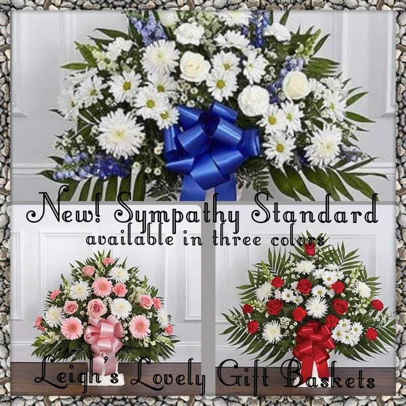 New Sympathy Standard is available in three color combinations: Blue and White, Pink and White or Red and White arranged in a floor basket and trimmed with a ribbon bow. Same Day Delivery Service is available. 

Blue & White: White Roses, White Carnations, White Snapdragpns, White Daisies and Blue Delphinium
Pink & White : Pink Roses, Pink Carnations, Whte Spider Mums and White Snapdragons

Red & White: Red Roses, Red Carnations, White Spider Mums and White Gladiolas