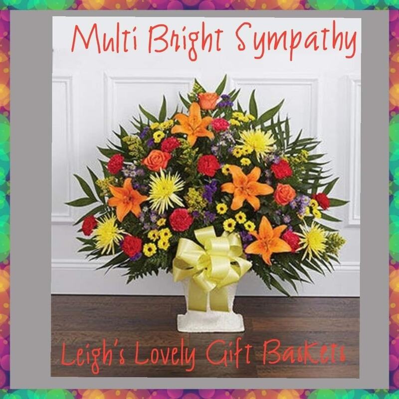 Multi Bright Sympathy is an uplifting and hopeful arrangement  with it's mix  of red, yellow, pink and orange colored flowers and greenery arranged in a floor basket. Flowers will include a mix of Roses, Lilies  and Carnations. This arrangement is usually sent to a family member, friend or business associate. Same Day Delivery Service is available.