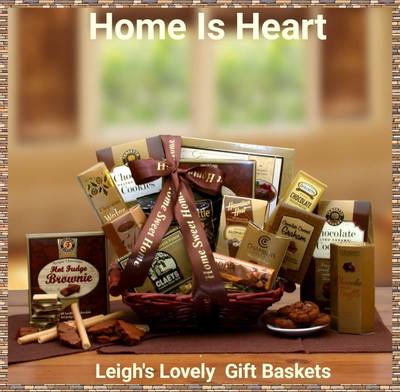 Home Is Heart $85.99 Dark stained tray style basket with decadent chocolates, cookies and sweets. Brown printed ribbon says Home Sweet Home
