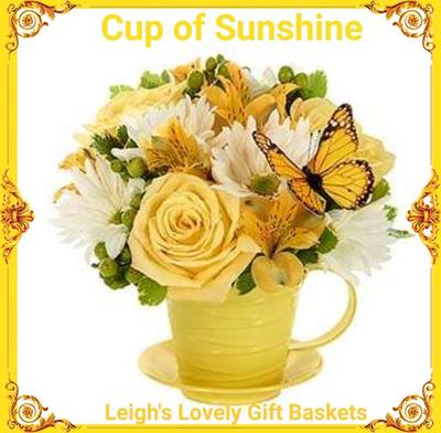 Cup of Sunshine  with Yellow Roses,White Daisies,Yellow Alstroemeria and
Seasonal Greens arrranged in a reusable yellow tea cup and saucer .  Same Day Delivery Service available