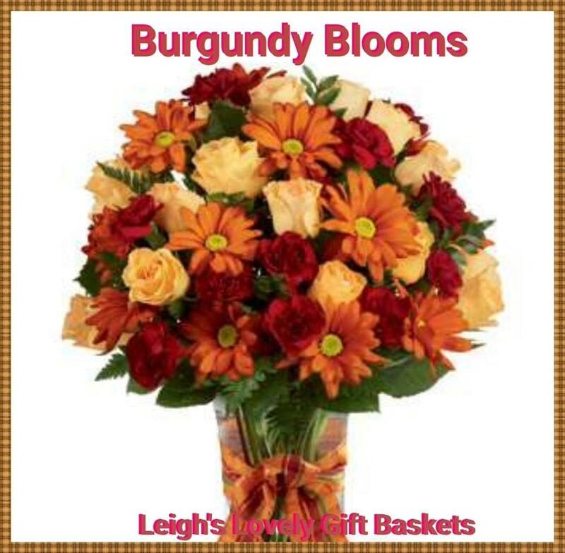 Burgundy Blooms is bittersweet with Peach Spray Roses,
 Burgundy Mini Carnations, and
Butterscotch Daisy Poms arranged in a glass vase tied with coordinating plaid ribbon. Same Day Delivery Service available. 
