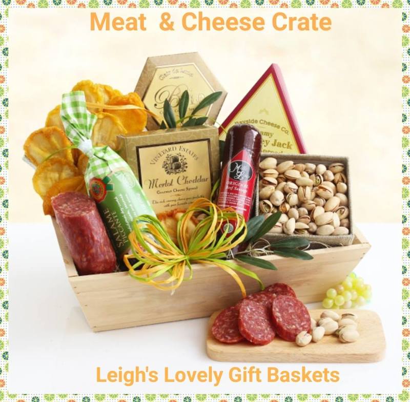 Natural finish wooden crate holds a savory snacking feast of Cheese Spread, Merlot Cheddar and Brie Cheese Spread,
Summer Sausage and
Dried Fruit