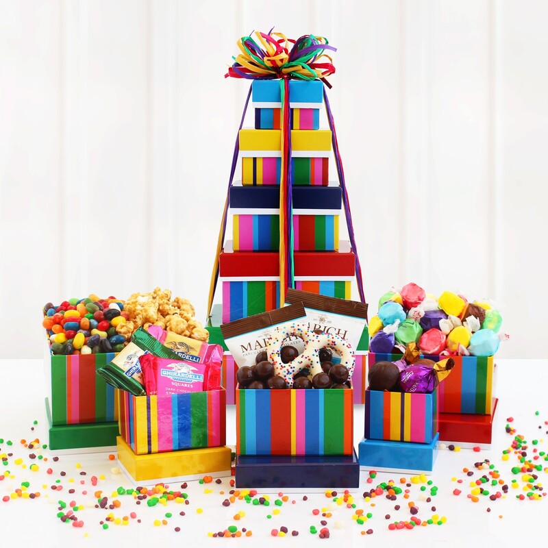 Colorful multi-color striped gift tower is filled with a variety of favorites :  Bavarian Pretzel, Sea Salt Caramels,Ghirardelli Squares,Truffles,Jelly Bellies,Caramel Popcorn, Salt Water Taffy 