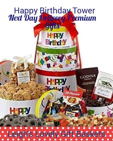 Festive Happy Birthday Tower boxes are filled with Ghirardelli Squares, Nunes Farms Mixed Nuts, Godiva Chocolate Pretzels and chocolate Chip Cookies. Next Day Delivery Service gets it there fast! 