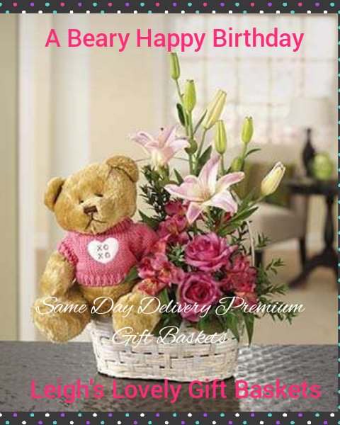  A winning combo! Pink lilies, roses and Alstromeria in a keepsake basket with an adorable plush bear! Bear wears a pink XO sweater .  Same Day Hand Delivery Service by a network provider