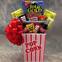 Nostalgic theatre popcorn box is filled with Classic Coke, classic candies,
Oreos,Wrigley's gum,and 
Microwave Popcorn