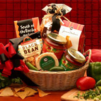 Natural Wicker Tray basket holds a delightful array of spicy gourmet snacks! Includes 
 Tavolare Spicy Snack Mix, Buffalo Bills Tortilla Chips
Garden of Eatin Black Bean Tortilla Chips,
Hot Pepper Cheese,
J and M Cheese Straw, Romano Cheese Twist Sticks,
Jose Pedro Chunky Salsa Mild ,
Jose Pedro Chunky Salsa Hot and a
Bandana