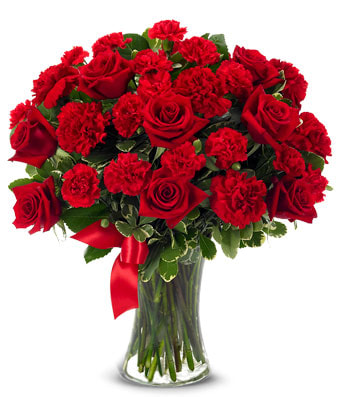 Red Heart Bouquet with Red Roses and Red Carnations with a Red Ribbon tied around a clear glass vase. Same Day Delivery Service is available. 