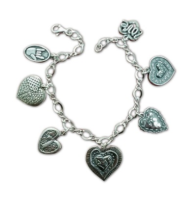 Love Love Love - 7 Heart Charm Bracelet $124.99  6 beautiful 100% Sterling Silver heart charms and 1 sign language “I love you” charm hang from this sweet figure 8 style charm bracelet.