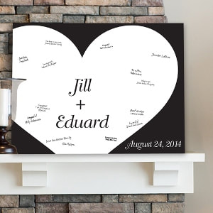 Classic black and white design with couple's first names and event date personalization. d event date personalization. Guests can sign the canvas, making it a memorable wall canvas for the couple's home! 