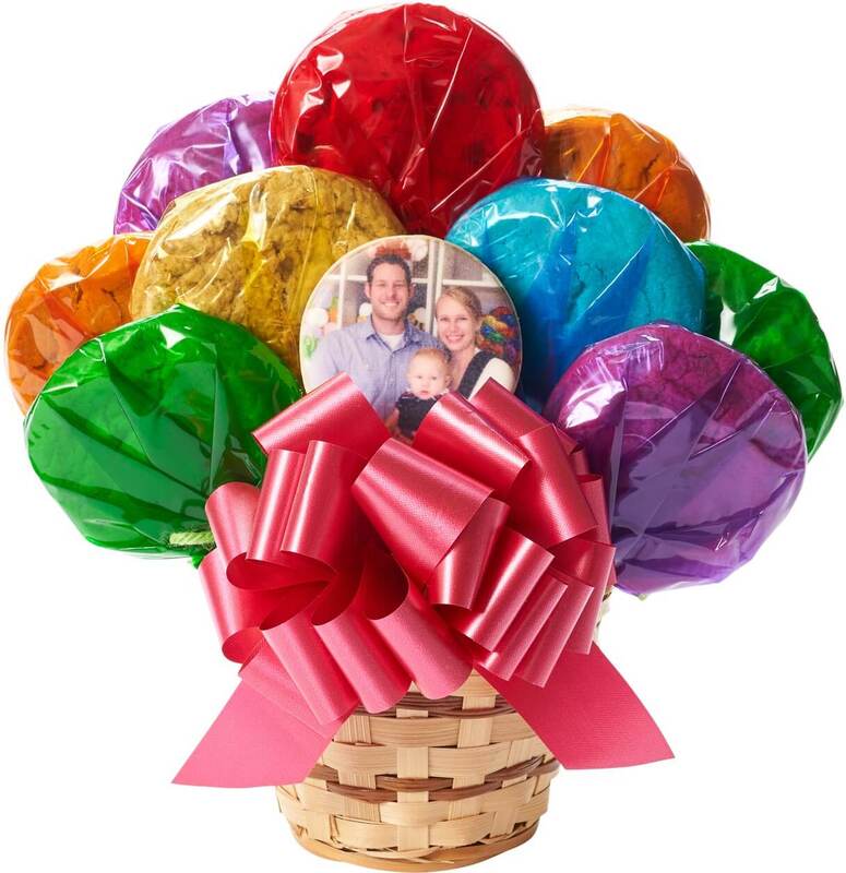 Cookie Bouquet. in a wicker basket with 11 homemade cookies wrapped in colorful cello and one photo or logo cookie in the center and tied with a bow! 