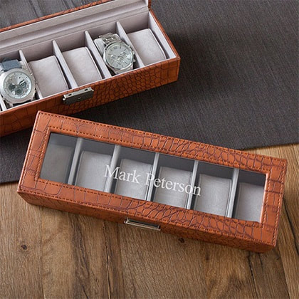  Brown Crocodile top-stitched leather watch case has a glass hinged lid to showcase and protect his watches!

It has 6 Suede like removable velvet watch cushions and polished nickel closure