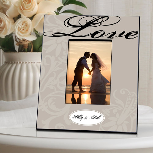 10 x 12 Personalized frames in 14 styles hold a 4x6 photo. Personalized with couples first bame 
