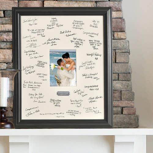 A wedding keepsake photo frame that doubles a guest book! Guests sign the photo mat, wedding photo featured and silver plate engraved with couples name and date. 