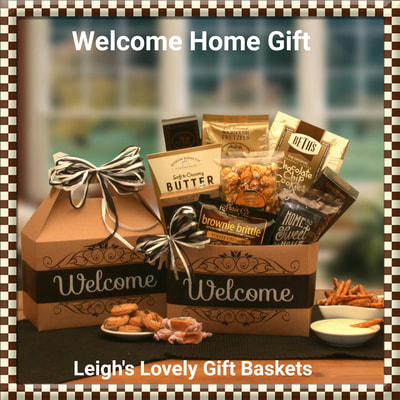 Welcome Home Gift Box. Kraft box with Welcome graphic and raffia ribbon. 