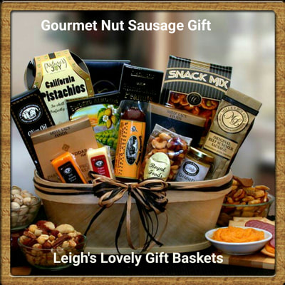 Attractive wooden gift basket is filled with a variety of savory snacks including Three pepper crackers, pimento stuffed olives, chocolate truffle cookies, smoked almonds, sea salt cashews, deluxe mixed nuts, hot pepper , vintage cheddar, and smoked Gouda cheese,grained mustard, beef summer sausage, beef salami, cutting board and mini cleaver.