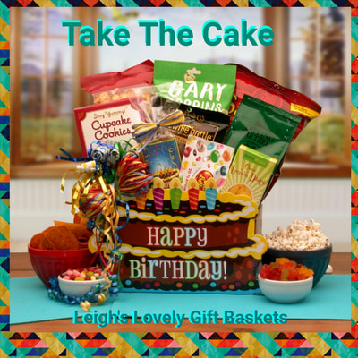 Festive Birthday cake gift box with raffia ribbon is filled with sweet and savory snacks