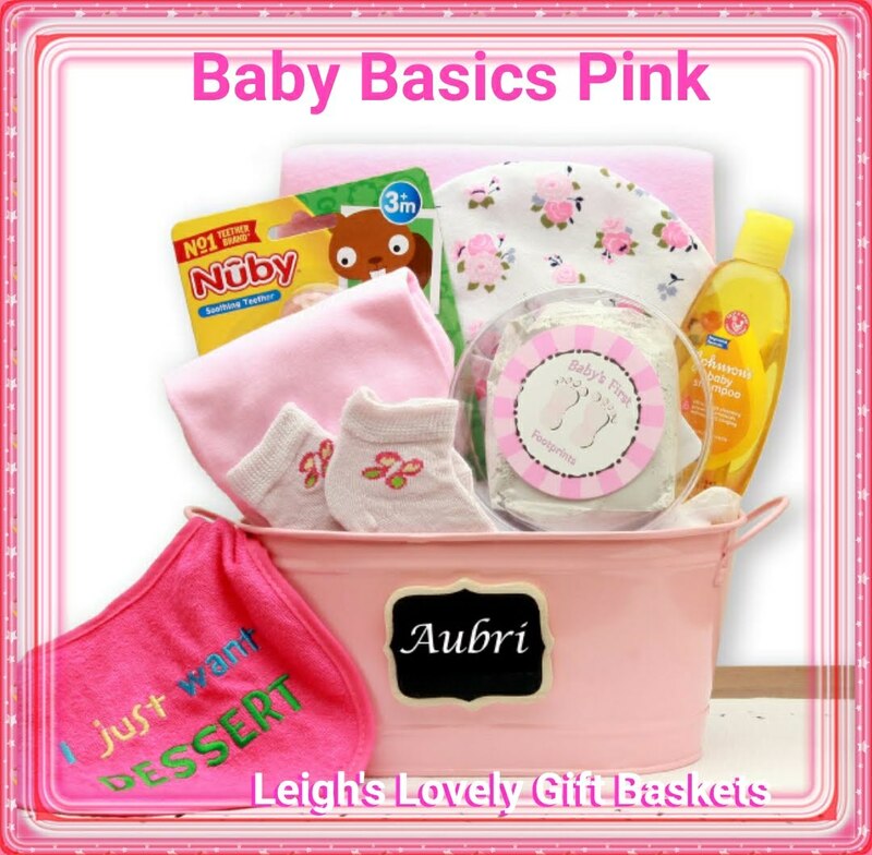 Pink painted oval storage tin has plaque that accepts hand written name to make it truly personal. Tin holds 
100% cotton baby onesie, Baby bib, baby booties, Baby beanie, Baby receiving blanket, Baby teether, Baby handprint keepsake kit, and Johnson and Johnson baby shampoo.