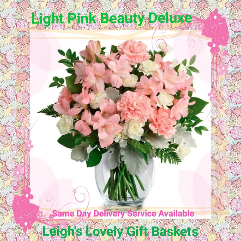 Light Pink Beauty Deluxe , a very soft and elegant bouquet of Pink Alstroemeria, Pink Carnations,
White Mini Carnations, Dusty Miller, Huckleberry, 
 Leatherleaf Fern and Lemon Leaf arranged in a  Clear Glass Vase.  Delivery is by a local network florist for Same Day Delivery Service Monday through Friday. 