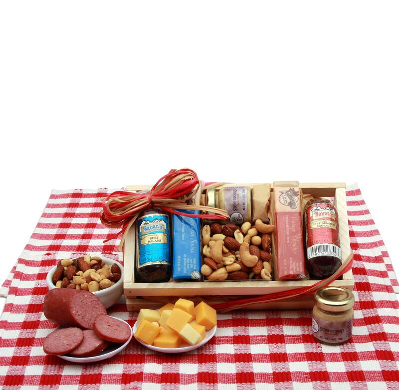 Pine gift tray 
Includes Bavarian Summer sausage, Bavarian Summer Salami, white cheddar cheese bar,  Swiss cheese bar,  stone ground mustard, deluxe mixed nuts. This gift come sin a solid pine crate that is wrapped in cellophane and topped with a raffia bow.