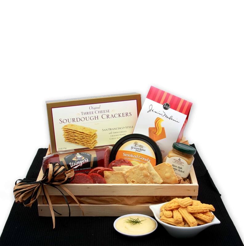 Solid pine wooden cratei is wrapped in cellophane and topped with a raffia bow. Includes Usinger's Famous biased cut Farmers sausage. smoked gouda cheese, San Francisco Three Cheese Crackers, Smokey Vineyard Estates Cheese Straws, and Maine Maple Champagne Mustard. 