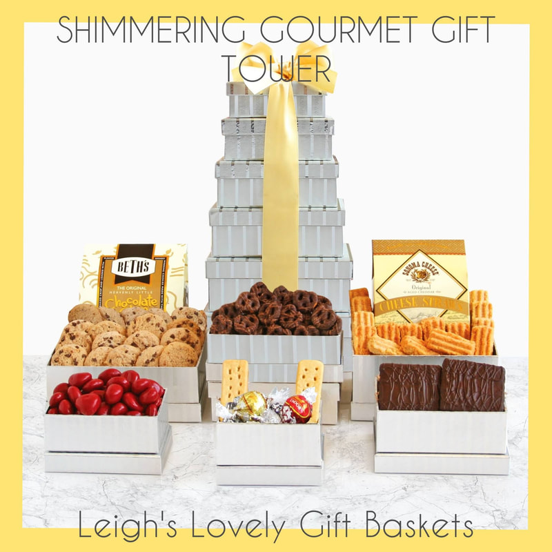 Shimmering silver embossed gift tower with gold ribbon bow holds a tasty variety of treats! Enjoy Chocolate-Covered Cherries, 2 Chocolate Chip Cookies, Shortbread Fingers, Cheese Straws, Chocolate-Covered Grahams,- Godiva Chocolate Pretzels, and  Lindt Chocolate Truffles