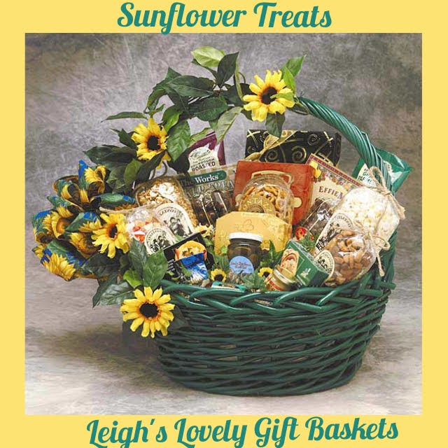 Generously sized green wicker basket is filled with  sweets for chocolate lovers,, snacks, snack mix,
cheese spread, Summer Sausage, mustard, crackers ,black olives, peanuts,
Gourmet Coffee
Cheddar Cheese and Honey Mustard Dipping Sticks and
Petite Fruit Candies