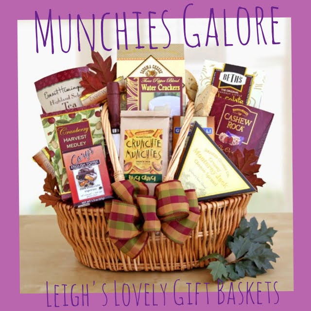 Natural,  woven basket accented with elegant striped bow holds a wonderful medley of snacking favorites! Includes Three Pepper water crackers, Monterey Jack cheese spread, Cranberry Harvest Medley, Cashew Roca, Beth's chocolate chip cookies, Crunchie Munchie snack mix, English toffee, Hemingway Select tea, Sonoma cheese straws, Ghirardelli milk and caramel bar, and a cheese knife.