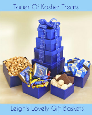 Brilliant blue tower with blue ribbon bow is filled with Kosher certified  caramel popcorn, Guylian chocolates, chocolate covered graham crackers, Snickerdoodle cookies and Ghirardelli chocolate squares.
