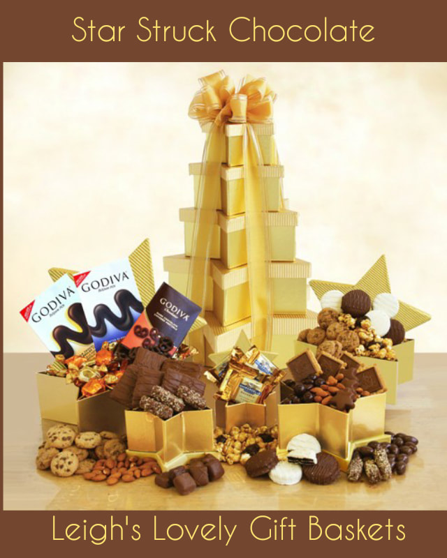 Dazzling five tiered, gold embossed, star shaped tower with gold ribbon bow is  filled with Godiva chocolate gems and Signature Biscuits, milk chocolate grahams, almond roca, Nunes Farms nuts, chocolate covered oreos, chocolate chip cookies, and chocolate pretzels 