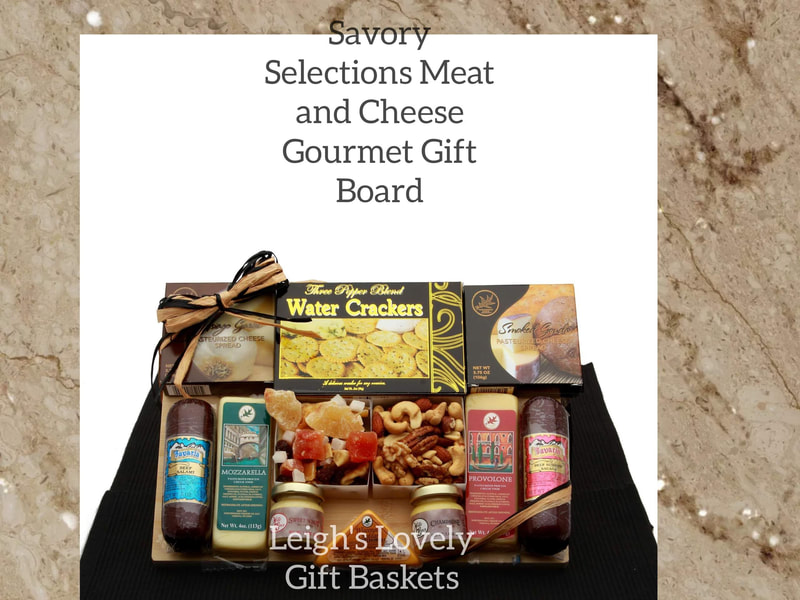 Gift Box includes Bavarian Summer sausage, Bavarian Summer Salami, 2 three pepper water crackers, tropical trail mix, deluxe mixed nuts, sweet N hot Mustard, champagne Mustard, provolone cheese bar,  Mozzarella bar, Wisconsin cheddar triangle, Smoked Gouda cheese spread, Asiago garlic cheese spread, on a solid bamboo cutting board measuring 12x10, wrapped in cellophane and completed with a raffia bow. 
Click here to connect to Leigh's online gift boutique. Select Gift Baskets from the Shop Menu
Select Meat, Cheese & Nuts Gift Ideas category