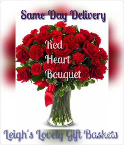Red Heart Bouquet with Red Roses and Red Carnations in a clear glass vase tied with red ribbon. Same Day Delivery Service available. 