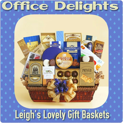 Generously sized, woven tray basket is trimmed with a gorgeous gold and blue bow and filled to overflowing for a snacking feast! Includes almond biscotti, Ghirardelli milk chocolate bar, Jelly Belly gift set,smoked salmon, water crackers, cheese, four kinds of cookies,peppermint popcorn, cheese straws, butter toffee pretzels, Dolcetto wafer rolls, sweet chipotle almonds, salami, Ghirardelli milk and truffle squares and truffles.