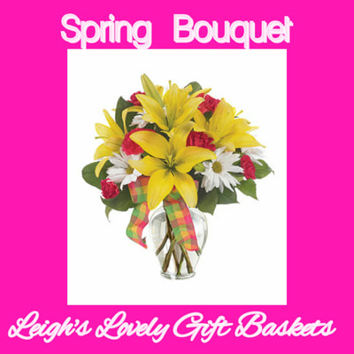 Spring Bouquet features Yellow Lilies,Red Carnations and White Daisies arranged in a glass Vase with decorative plaid ribbon. Same Day Hand Delivery Service.