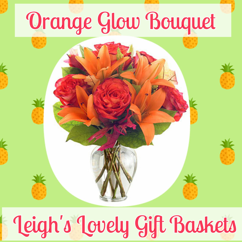 Orange Glow Bouquet is vibrant with Orange Roses and Orange Lilies in a clear glass vase. Same Day Hand Delivery Service available