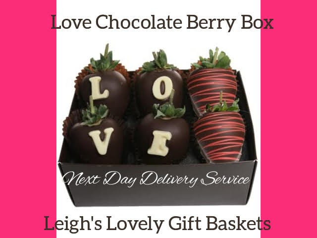 Love Chocolate Berry Box

Chocolate Covered.
Six juicy strawberries are hand dipped in Belgian Chocolate and decorated with an edible  L-O-V-E message.
• Six Strawberries
Four with Chocolate 'Love' Message
Two  Dipped in Belgian Chocolate and decorated with red drizzle. 
• Delivered in Gift Box
Photo connects to Leigh's online gift bouitique. 
